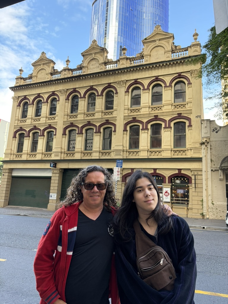 Mark and Jethro outside 127 Margaret Street, Brisbane, July 2026